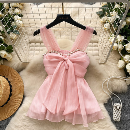 Imported Rhinestone Neck Bow Peplum Padded Top