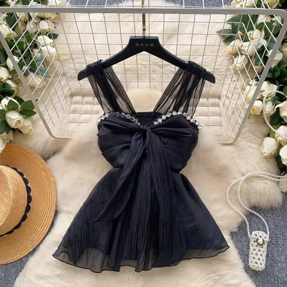 Imported Rhinestone Neck Bow Peplum Padded Top